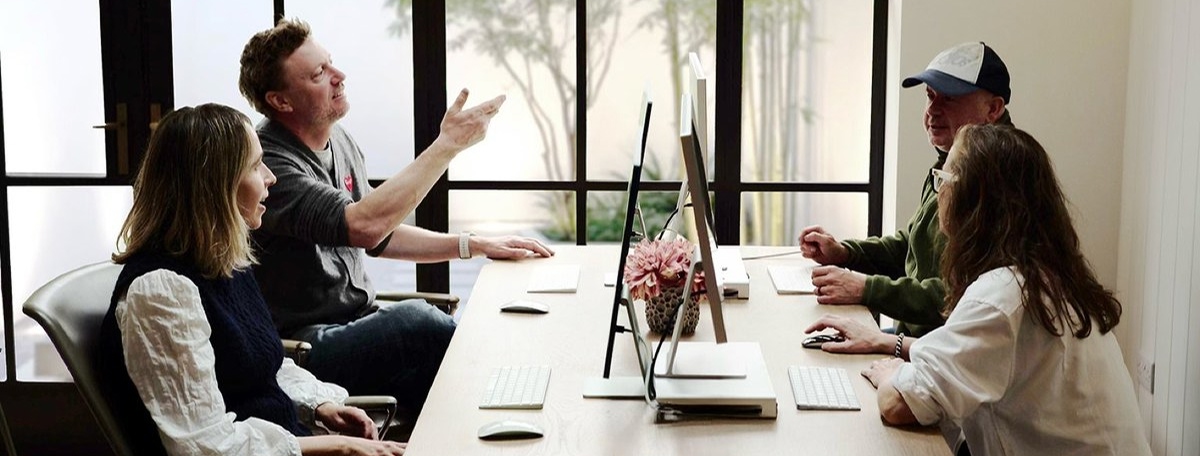 Unvisible working with a team around a table